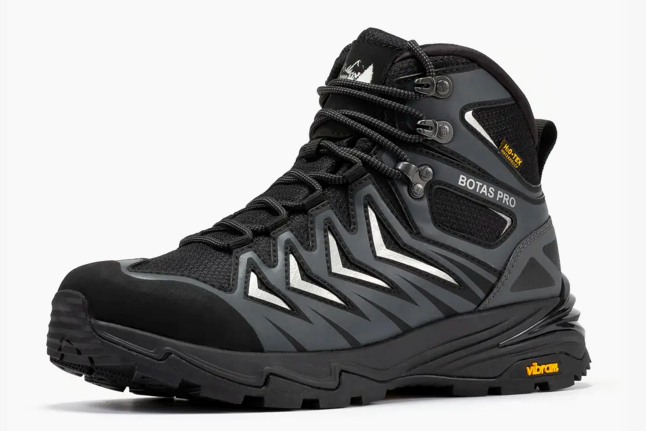 Men's black waterproof hiking boot with Vibram outsole, side view