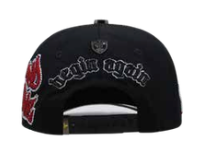 Men's black embroidered snapback cap, side angle view 1