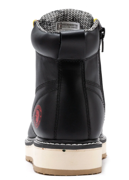 A black leather ankle boot shown from the back, featuring a cream-colored sole, a red circular logo patch, and a patterned lining at the collar.