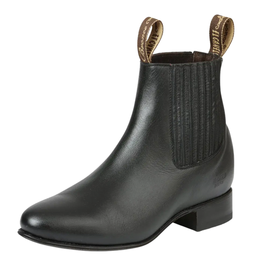 A black leather Chelsea boot with a low block heel and elastic side gore, shown from a three-quarters angle on a white background.