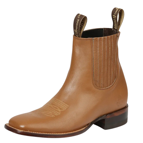 A tan leather ankle boot with a square toe, elastic side gore, and pull tabs, shown on a plain white background.